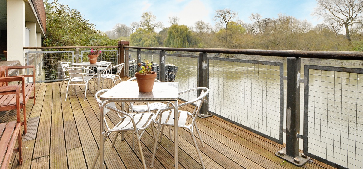 A photo of Watermans' riverside terrace and this page helps you find out more about us - who we are and what we do.